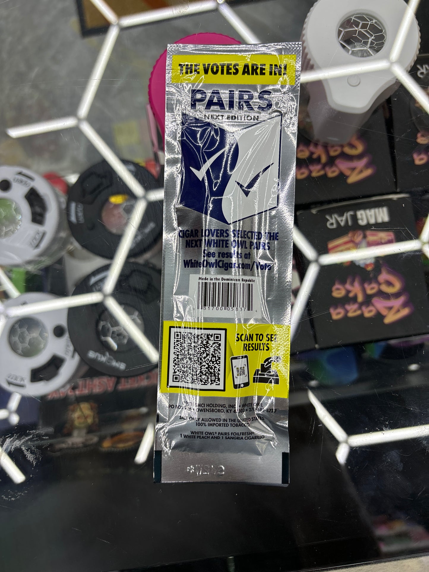 White owl moon pairs white peach, sangria, cigarillos