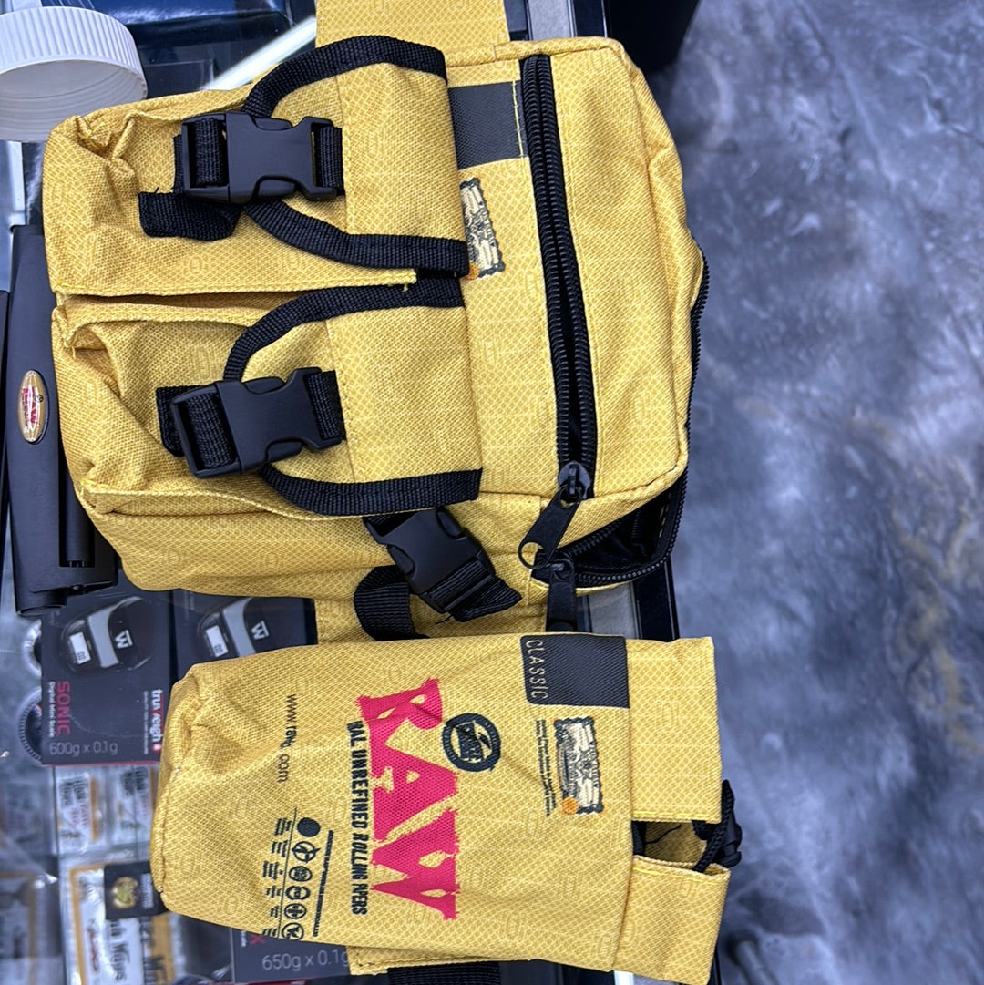 Raw fanny pack. Kit comes with portable water, jug, bong, roller scale, tray, and grinder.