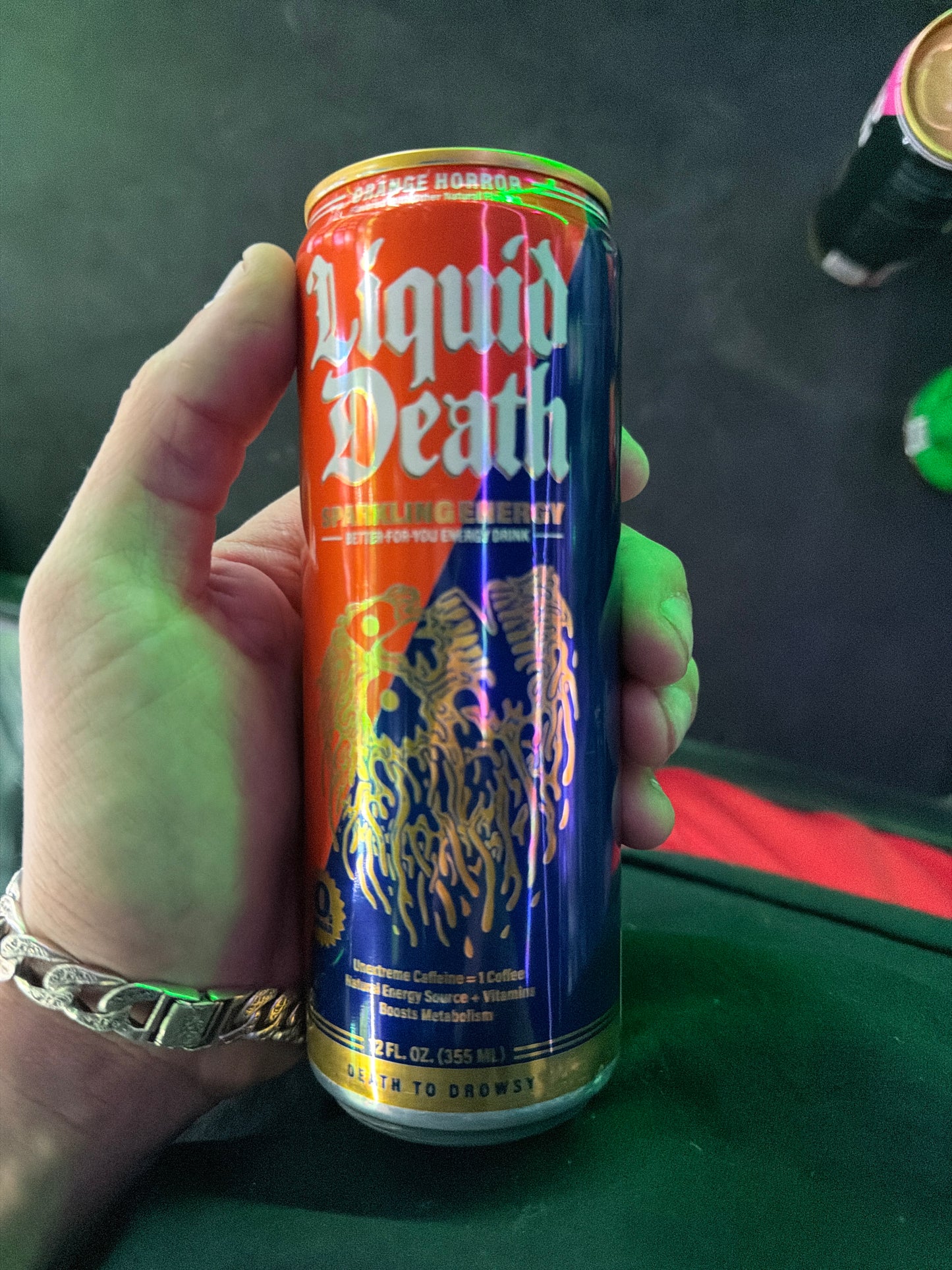Liquid death sparkling energy orange horror