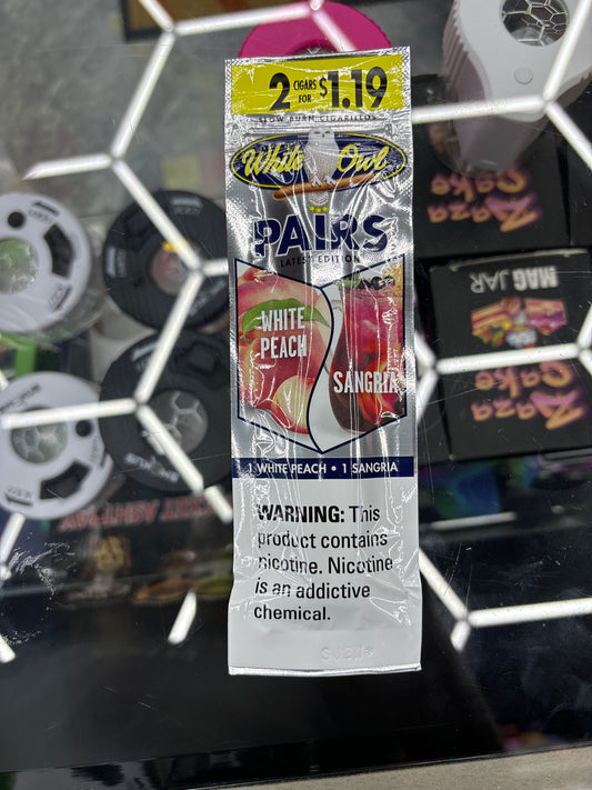 White owl moon pairs white peach, sangria, cigarillos