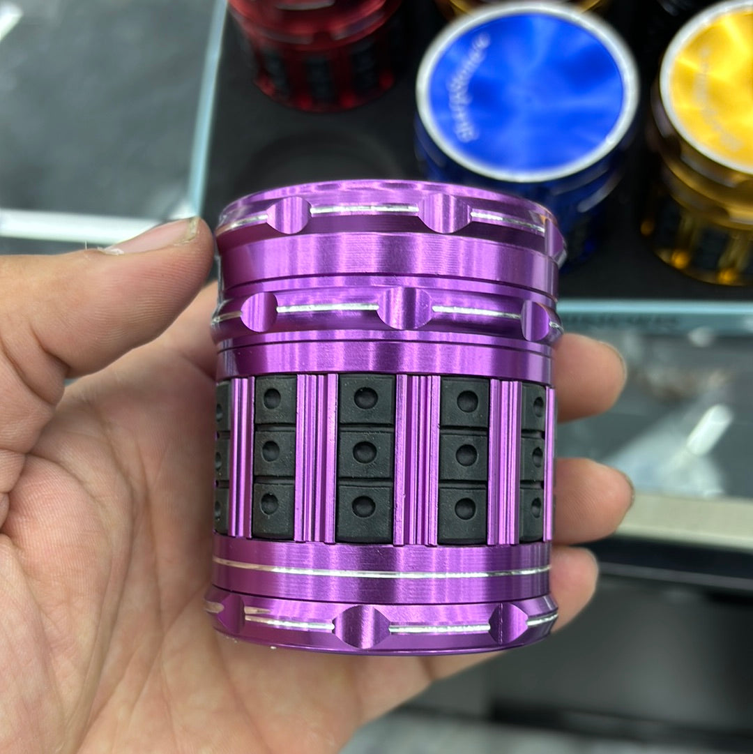 Stardust premium grinder long barrel with plastic grip on sides, sharp stone