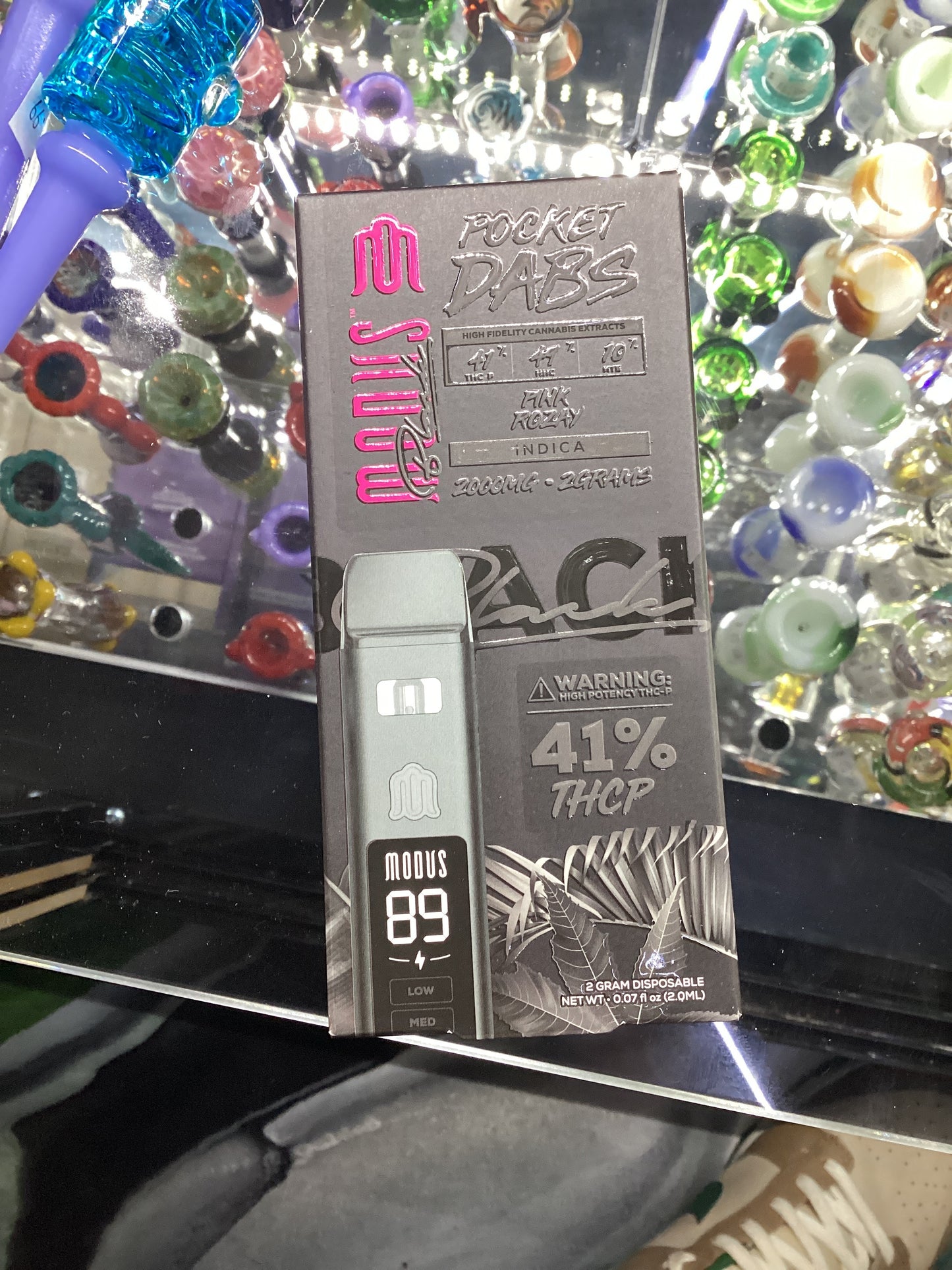 Modus black pocket dabs 2g disposable pink rozay indica