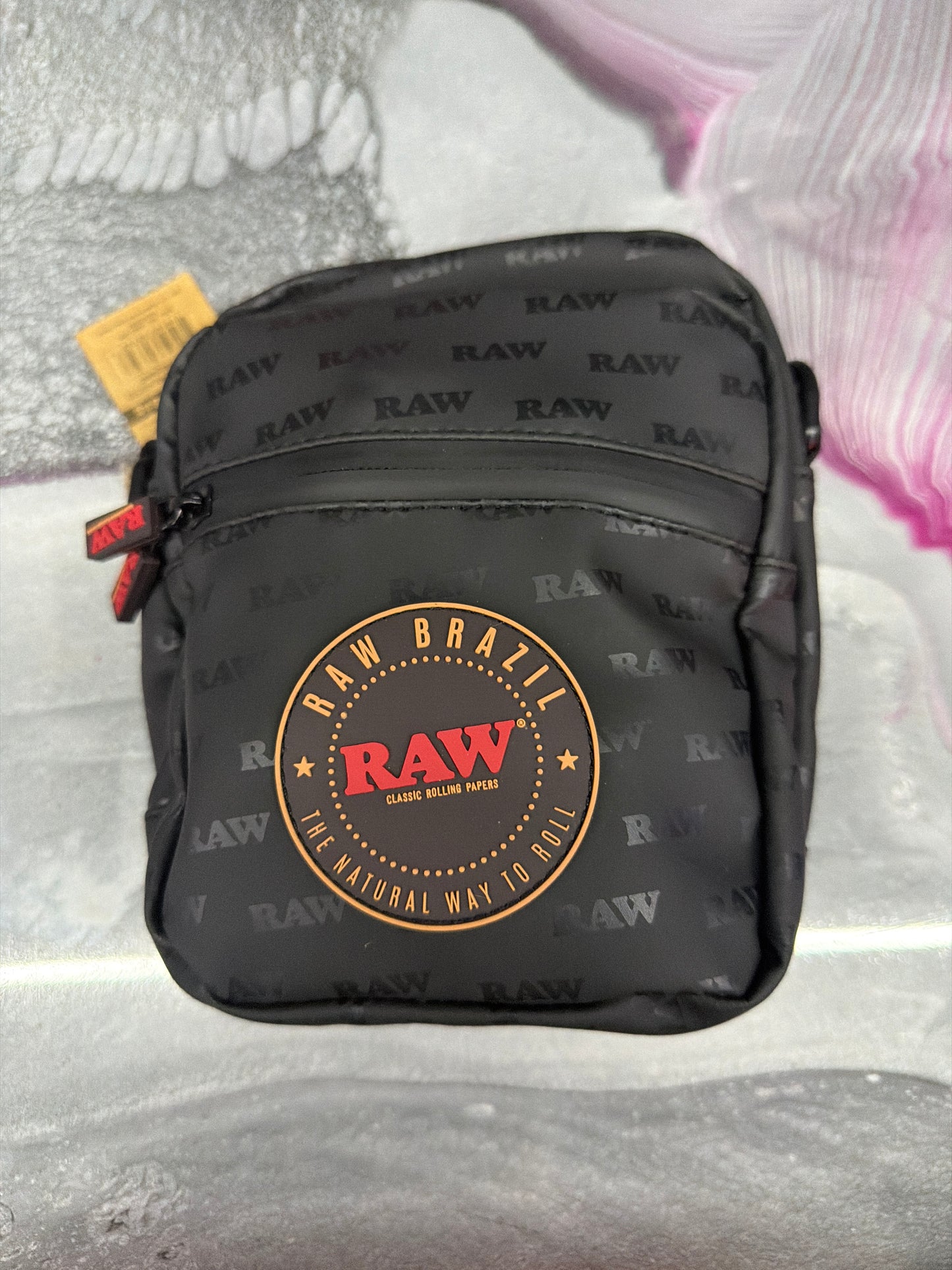 RAW CROSS BODY BAG