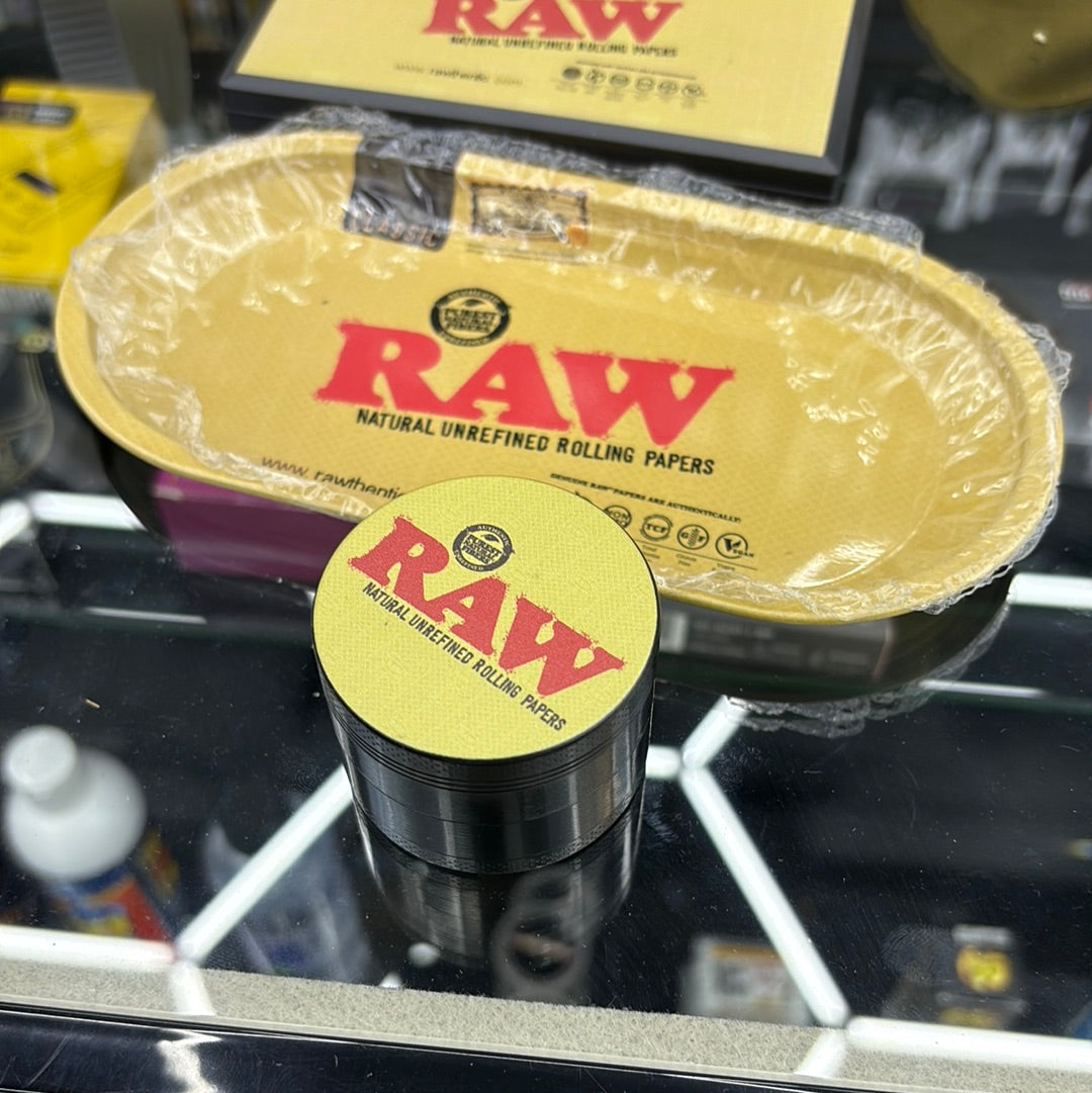Raw fanny pack. Kit comes with portable water, jug, bong, roller scale, tray, and grinder.