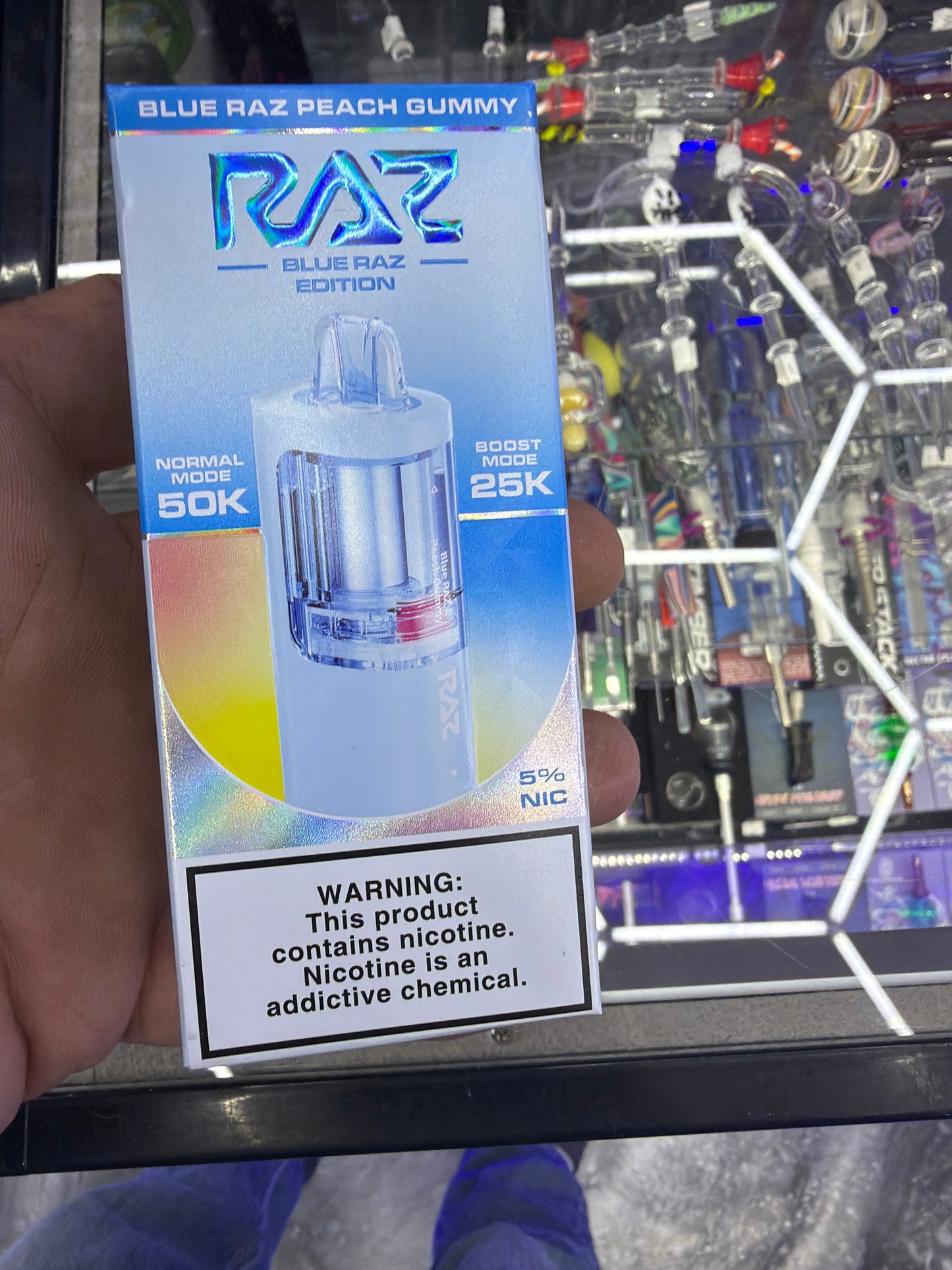 Raz pod 50 K blue razz peach gummy