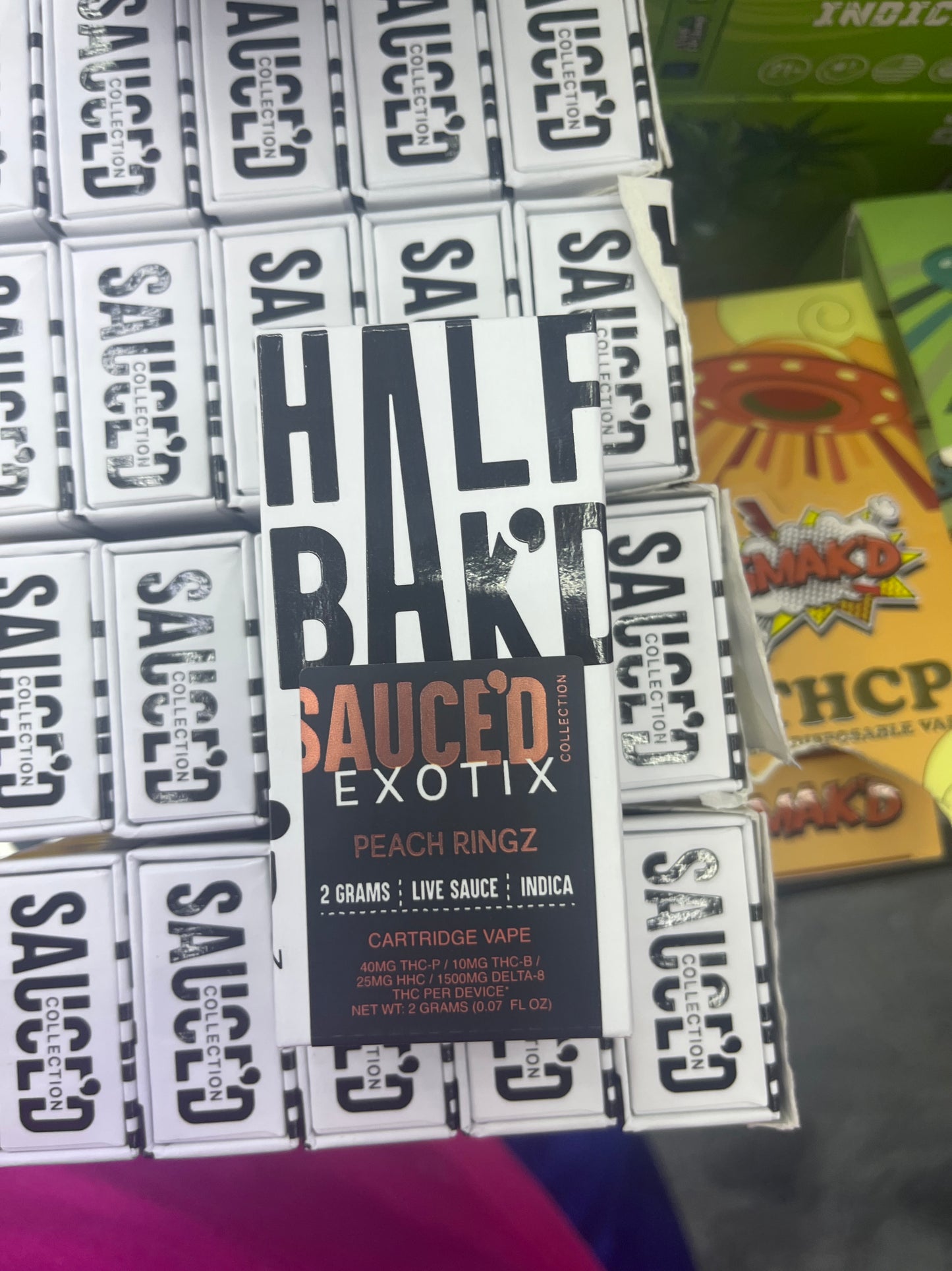 Half bakd 2g live sauce cartridge peach ring indica