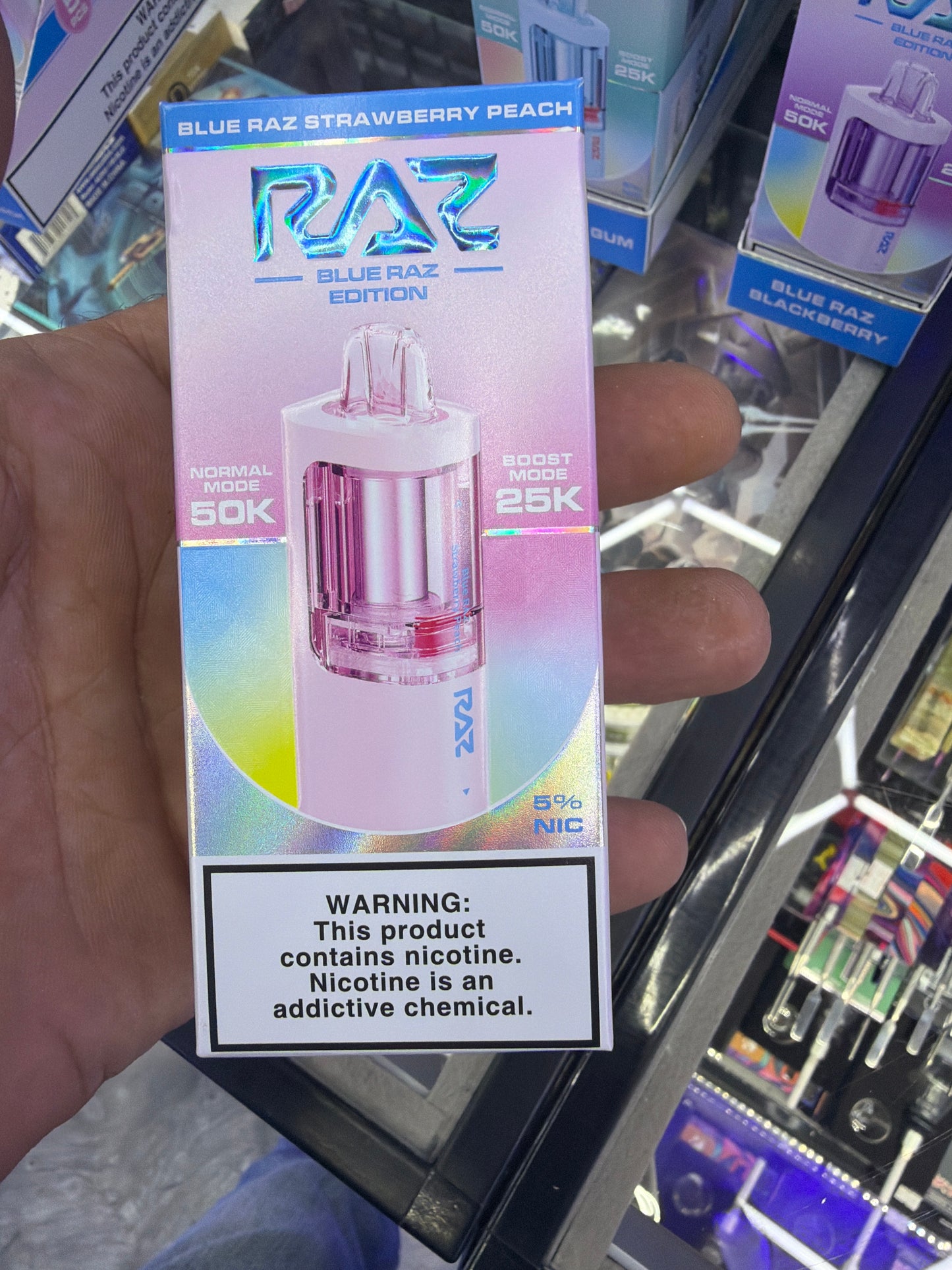 Raz 50 K pod blue grass, strawberry peach
