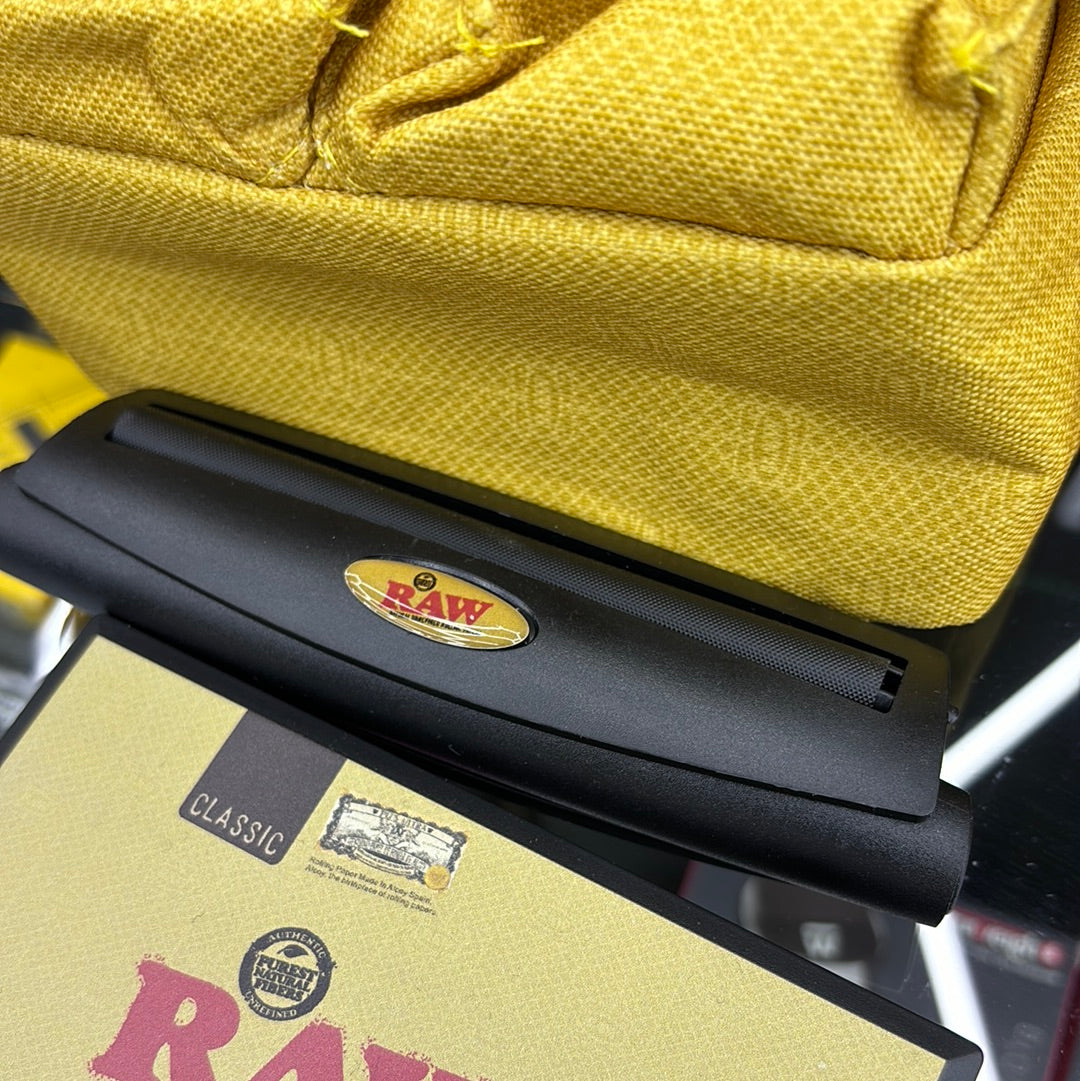 Raw fanny pack. Kit comes with portable water, jug, bong, roller scale, tray, and grinder.