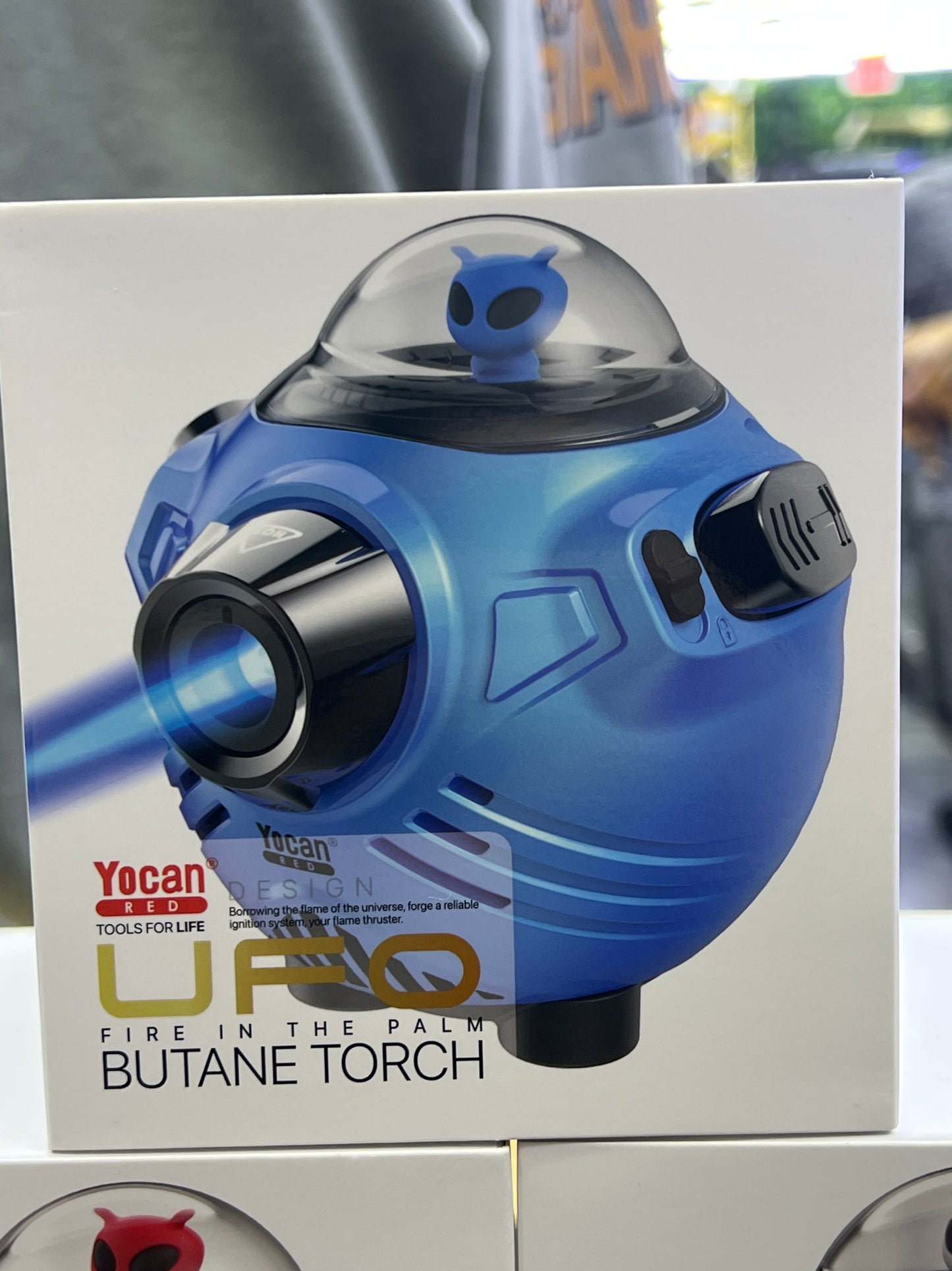 Yocan Red UFO fire in the palm butane torch blue