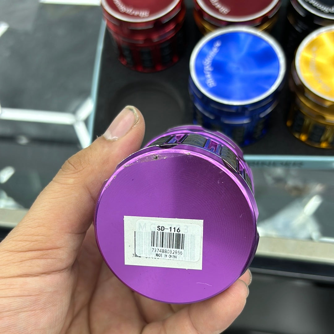 Stardust premium grinder long barrel with plastic grip on sides, sharp stone