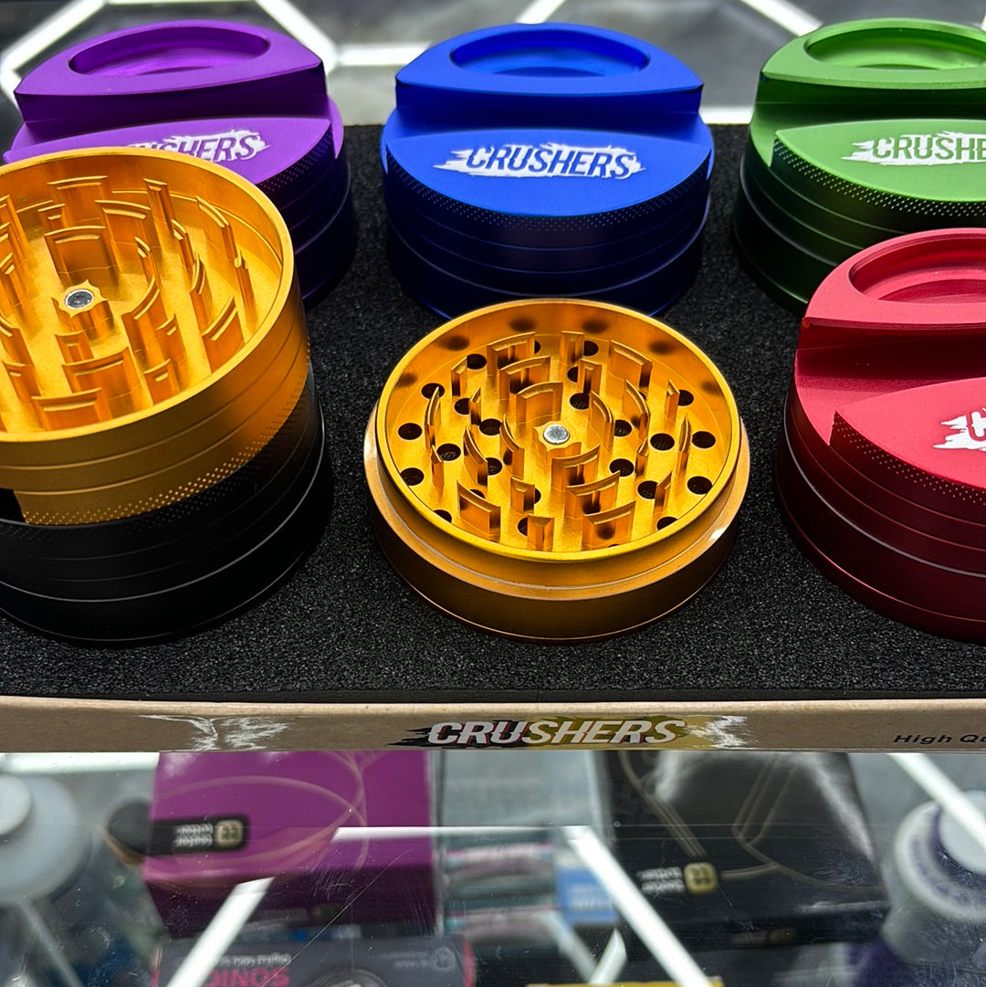 Crushers, grinder, ashtray, and joint paper holder