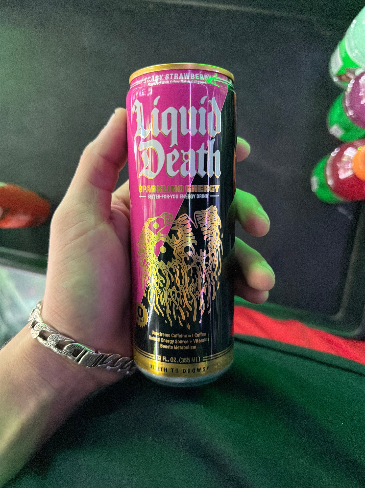 Liquid death sparkling energy scary strawberry